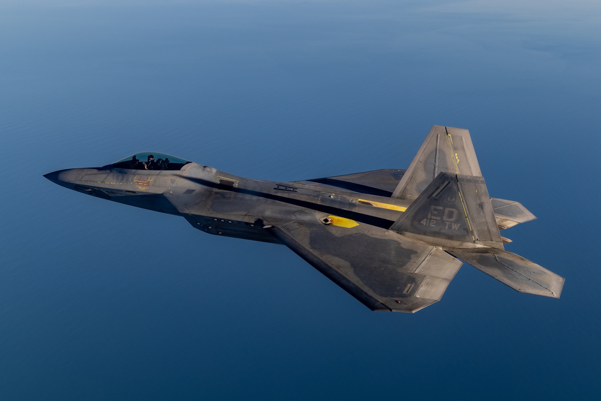 F-22 Raptor in flight over the Pacific Ocean